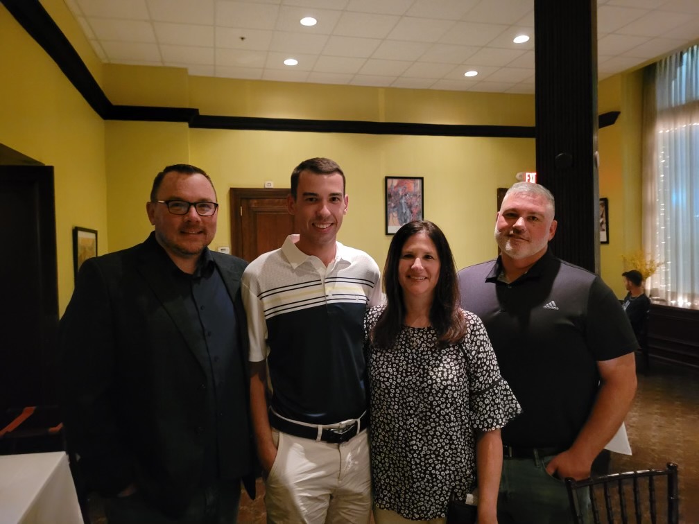Mike and Officer Smith's family Lieutenant Mike Hatch, fellow Family Liaison Officer, and Officer Smith's family from 2023